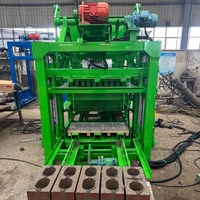 Machine à fabriquer des blocs de briques creux semi-automatiques QTJ4-28 populaire à bas prix en Tanzanie