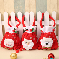 Vente en gros de petits sacs à bonbons en molleton avec cordon de serrage pour les décorations de Noël pour la promotion et les cadeaux