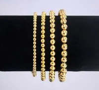Braccialetti impilabili in rilievo con perline riempite in oro 14k fortunato all'ingrosso minimalista