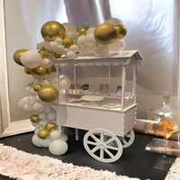 Chariot mobile cylindrique 2026 en promotion pour fleurs, bonbons et chocolats, présentoir sur roulettes