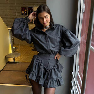 Conjunto de dos piezas de temperamento de nuevo estilo al por mayor 2025 para mujer con falda corta con borde de volantes y diseño a <span class=keywords><strong>cuadros</strong></span> de alta calidad - Product Image 1