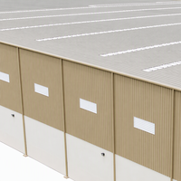 Entrepôt à structure en acier avec bureau en verre sur deux étages et toit avec puits de lumière pour le stockage industriel