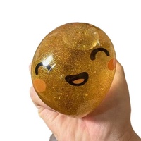 Jouet anti-stress à presser en forme de grand pain vapeur, style paillettes dorées, avec expression de dessin animé, à rebond lent, effet miroir croisé