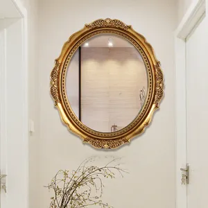 Prix de gros Miroir de salle de bain décoratif ovale classique européen élégant en or Cadre de miroir décoratif en PU pour chambre à coucher