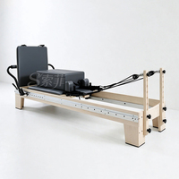 Machine de Pilates Reformer en bois d'érable massif, équipement durable, avec lit australien à rail intégral, pour studio de yoga et de Pilates à la chaîne