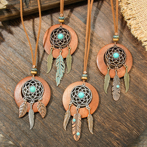 Colgante Boho de Aleación Atrapasueños con Piedra Turquesa y Pluma para Joyería de Moda Unisex - Product Image 1