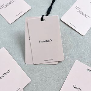 Tùy chỉnh thương hiệu nổi logo màu hồng giấy hangtag cho quần áo cho hàng may mặc giày túi với phong cách Swing - Product Image 5