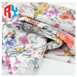 China Textile Snowflake Printed Chiffon Polyester Fabric Yellow Flower Printing Women Clothes Fabric for Summer