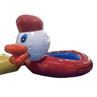 Petite piscine gonflable portable en forme de canard pour le divertissement des enfants en intérieur et en extérieur.