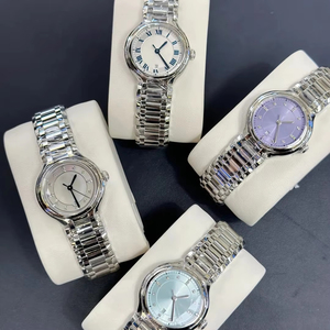 Élégant et classique, index des heures sertis de diamants, mouvement à quartz précis en acier inoxydable, affichage de la date, cadran multicolore - Product Image 1