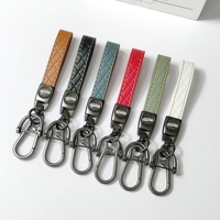 Porte-clés de luxe matelassé en cuir PU avec mousqueton en alliage de zinc, fermoir mousqueton, gaufré, style rétro, élégant, pour homme