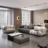 Canapé modulaire une place, design droit et d'angle, color block, effet nuage, en tissu bouclé, gris anthracite et crème, ensemble bas
