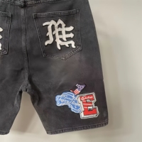 Shorts noirs brodés MIXED EMOTION, vente en gros de la marque de mode américaine