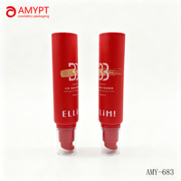 Tube cosmétique rouge en PE de 30 à 100 ml avec pompe à vide, tube d'extrusion pour fond de teint, émulsion liquide, crème, emballage avec bouchon à pression