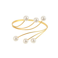Al por mayor Brazalete de moda de metal dorado para mujer, de verano, con diseño floral exagerado, perlas, espiral y geométrico, brazalete abierto superior