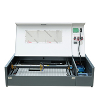 Mesin Pemotong & Pengukir Laser CO2 3D Photo Crystal Mini 50W/40W untuk Batu Kayu MDF dengan Sistem Bantuan Udara dan Sistem Pendingin Air.