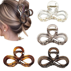 Nouvelle pince à cheveux de style haut de gamme en forme de nœud pour femme, pour une coiffure mi-attachée à l'arrière de la tête. Vente en gros disponible. - Product Image 1