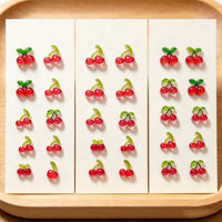 Breloques 3D transparentes en résine en forme de petites cerises, ornements brillants pour ongles en forme de fruits, mini décorations mignonnes pour manucure DIY et ongles à presser