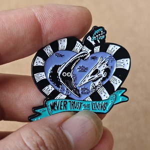 Pin esmaltado de Beetlejuice con la frase "Never Trust the Living", broche de Adam y Barbara Maitland - Product Image 5