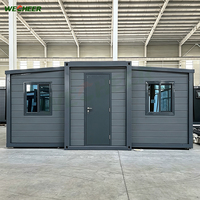Bâtiment modulaire extensible résistant aux intempéries, maison conteneur extensible, vente en gros, préfabriqué sur mesure 20 pieds pour chambres de camping