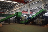 Déchiqueteuse de pneus automatique à double arbre multifonctionnelle Nanjing Shengzhong, machine de broyage pour déchets plastiques et caoutchouc