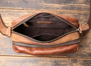 Sac bandoulière unisexe en cuir véritable avec fermeture éclair, grande capacité, imperméable, design tendance - Product Image 5