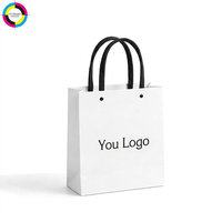 Sac shopping en papier couleur mate avec logo personnalisé, poignée en ruban noir, sac cadeau écologique pour petites entreprises