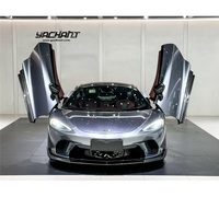 Kit carrosserie en fibre de carbone sèche style D GT MIW 2019-2022 pour McLaren GT, comprenant capot, canards, lèvre avant, jupes latérales, seuils de porte, diffuseur arrière et aileron