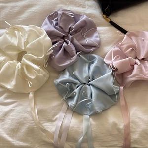 Accessoires pour cheveux : Chouchous en tissu satiné élégants, style ballet, décontractés et raffinés, avec nœud en ruban - Product Image 3