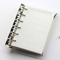 Vente en gros de classeur à spirale à feuilles mobiles A5 A6 A7 Grille de points Hebdomadaire/Mensuel Page intérieure Style imprimé Nouveau design Papier pour cahier
