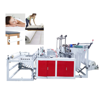 Machine de fabrication de rouleaux de draps jetables non tissés pour hôpitaux, spas et salons, avec perforation automatique