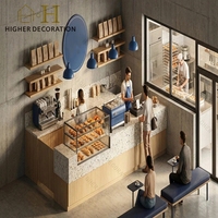 Comptoir de bar en bois et marbre de luxe sur mesure, vitrine de présentation de pâtisserie en verre pour les boutiques de pâtisserie modernes, design d'intérieur