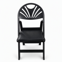 Chaise pliante en résine PC noire de qualité supérieure avec dossier éventail et assise rembourrée en PU souple, robuste, idéale pour événements, mariages et banquets, disponible à la location