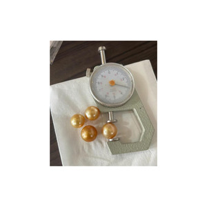 Una perla marina de oro de grado AA especial, de 12 mm, emana una elegancia atemporal, perfecta para joyería fina y adornos elegantes. - Product Image 2