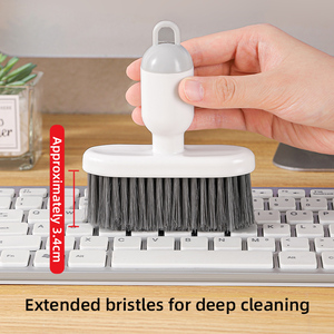 <span class=keywords><strong>Limpiador</strong></span> de <span class=keywords><strong>teclado</strong></span> de plástico PP de oficina multifuncional, cepillo pequeño de limpieza para el hogar blanco y gris clásico - Product Image 2