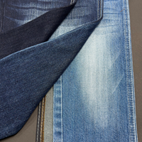 Tissu en jean bleu foncé vintage, mélange coton et élasthanne, texture slub, rouleaux de denim de haute qualité en gros