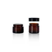Pot en verre brun durable avec couvercle noir minimaliste pour échantillons de baume à lèvres écologiques 15g