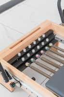 Logo personnalisé en bois d'érable de Hong Kong repose-pieds à l'infini réformateur de pilates en bois clinique