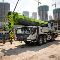 Grue mobile d'occasion de 100 tonnes, flèche à 6 sections de 60,5 m, transmission 8x4, contrepoids de 23,5 t pour la maintenance des tours de refroidissement