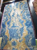大理石の床タイル用の豪華なライトブルーオニキス大理石の壁パネルナチュラルブルーオニキススラブ