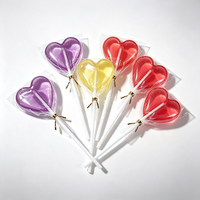 Groothandel op maat gemaakte halal transparante hartvormige harde lolly's gemengde kleuren fruit smaak snoepjes voor Valentijnsdag kinderfeestje cadeau OEM