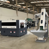 Machine de soufflage par étirage de PET entièrement automatique à 4 cavités, 4000 BPH, avec moteur et composants de moteur Mitsubishi PLC