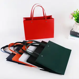 Sacchetti di carta per la spesa personalizzati piatti quadrati di alta qualità all'ingrosso con imballaggio per vestiti con manico per rivetti