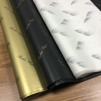 Papier d'emballage en tissu coloré de marque imprimé avec un logo doré/blanc/noir de luxe