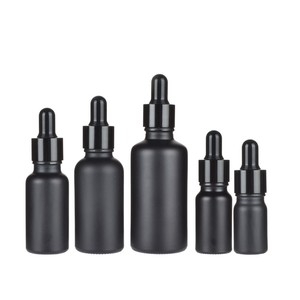 Botella de Vidrio de Borosilicato Negra Cilíndrica para Perfume o Aceites Esenciales con Calcomanía, Vacía, Venta al por Mayor de Fábrica - Product Image 1