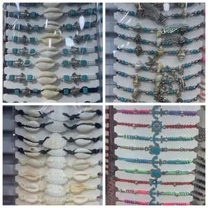 Shell de cowrie com presentes, natural, quente, mar, esfregão, miçangas de metal, corda, pulseira, tornozeleira, mulher, jóias, presentes de praia