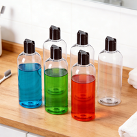 Bouteille en Plastique Transparente avec Couvercle Pression Noir, Adaptée pour Shampooing, Lotion, Crème Visage, Récipient Rechargeable