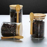 Gelas borosilikat ramah lingkungan makanan bumbu, toples permen biji kopi, toples penyimpanan kaca bening dengan sendok kayu bambu dan tutup