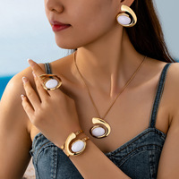 Ensemble de bijoux personnalisé style resort en alliage de zinc et acrylique, motif spirale escargot, comprenant collier, boucles d'oreilles, bracelet et bague, cadeau unisexe