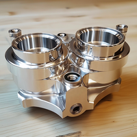 Cuves de carburateur de moto en aluminium CNC haute performance à double sortie, personnalisables et usinées
